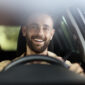 handsome smiling latin man driving a car car shar 2025 02 20 09 23 42 utc 85x85